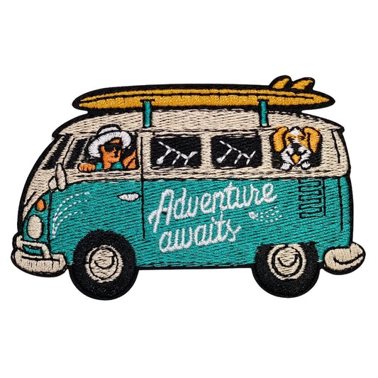 Retro travel-inspired van patch featuring a vintage camper van, surfboard on top, driver and dog details, and road trip adventure lettering embroidered patch