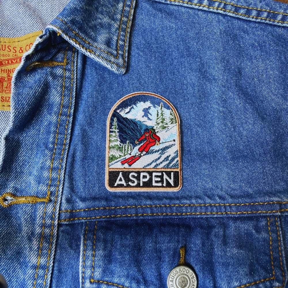 Ski Adventure Aspen Patch on a backpack – iron-on embroidered patch
