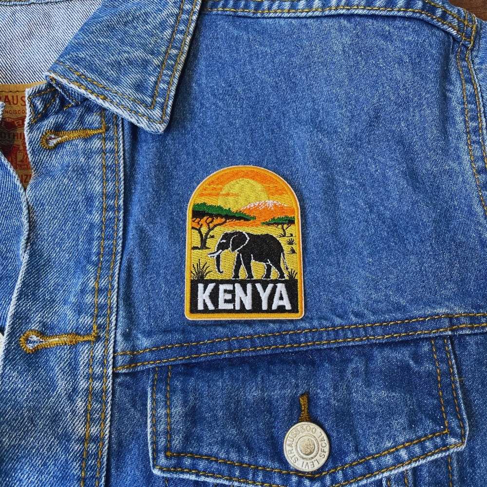 Savannah Sunset Kenya Patch on a backpack – iron-on embroidered patch