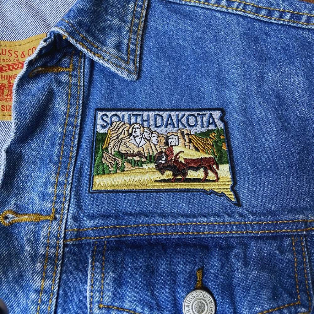 South Dakota Patch on a backpack – iron-on embroidered patch