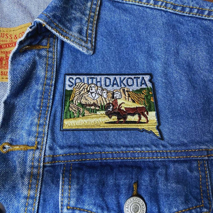 South Dakota Patch on a backpack – iron-on embroidered patch